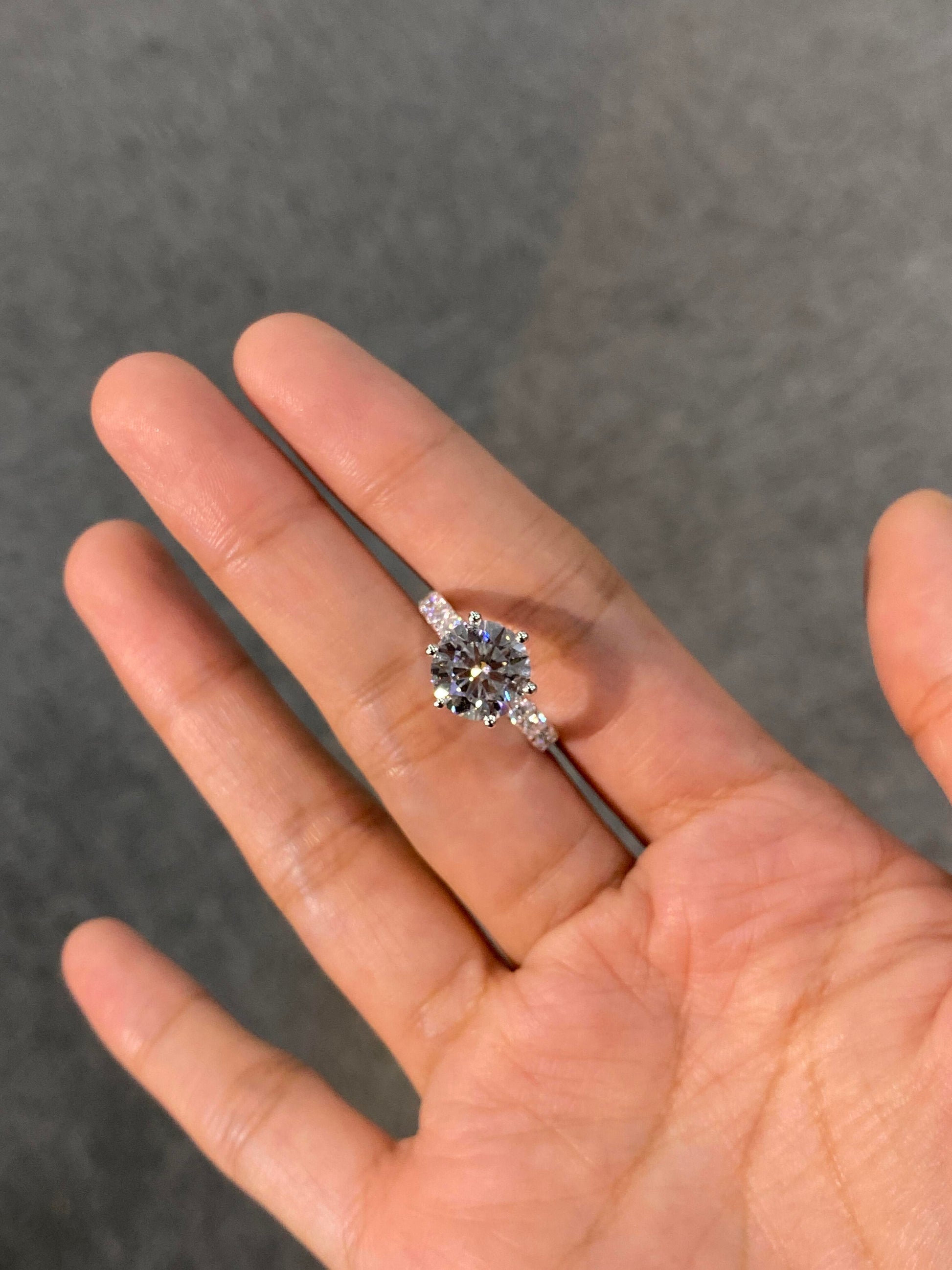 Six-prong setting, Round Brilliant Lab-Grown Diamond—radiating dazzling brilliance, featuring D color and VS1 clarity